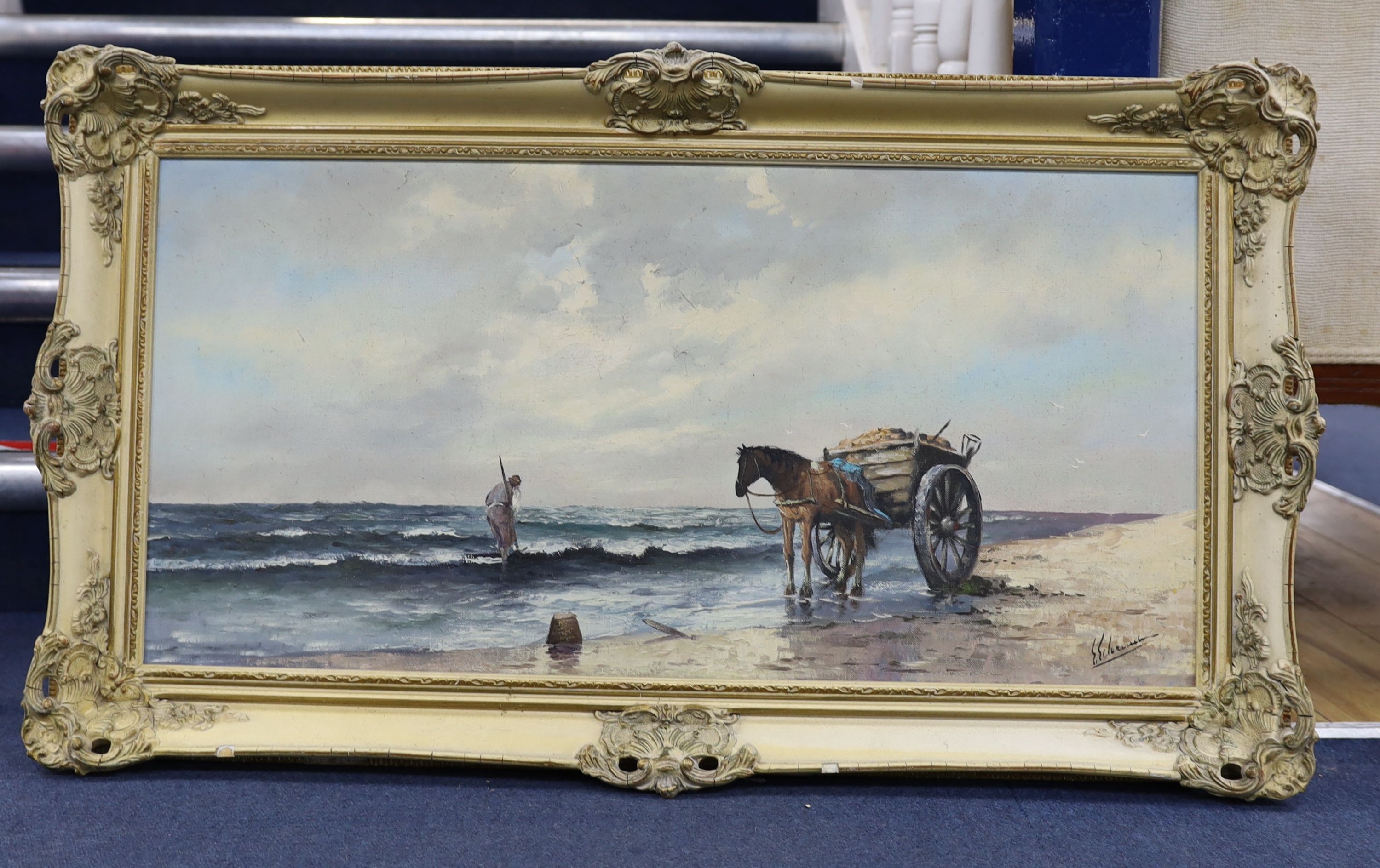 German School, oil on canvas, Seaweed gatherer along the shore, indistinctly signed, 39 x 79cm